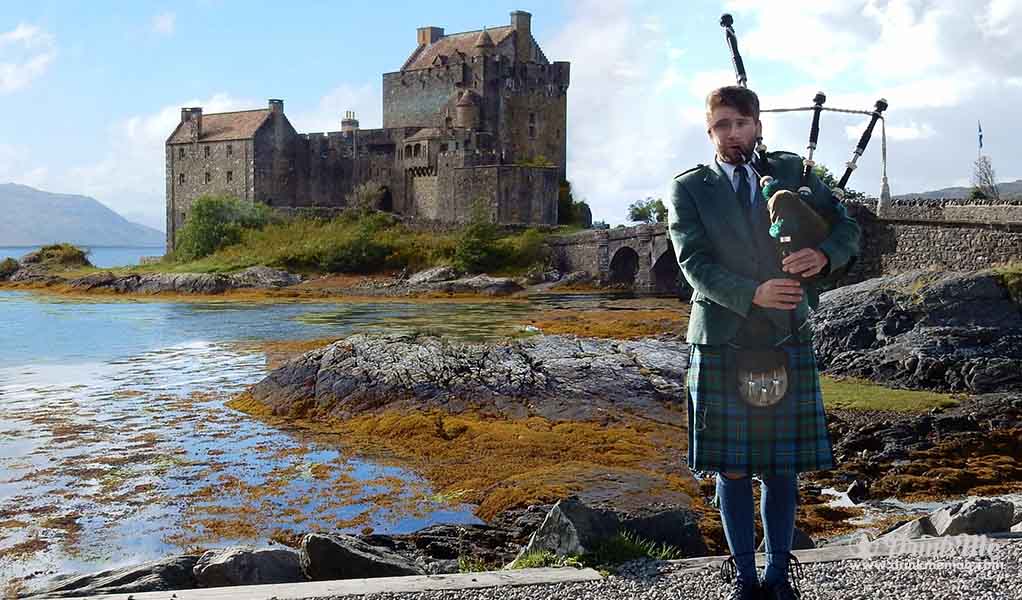 Step One Bagpipes Piper at Eilean Donan Castle, Scotland drinkmemag.com drink me Burns Night