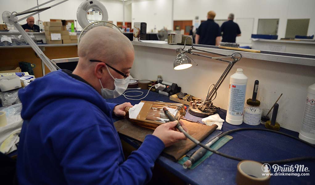 Bottle buffing at the Glencairn factory drinkmemag.com drink me Glencairn